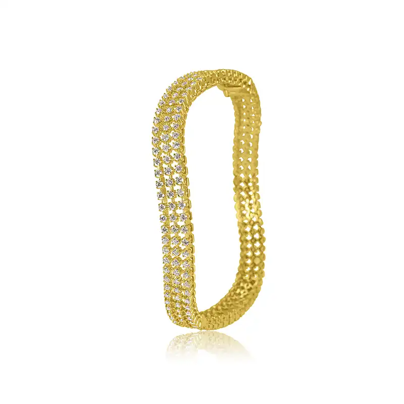 Uniquely shaped bangle in 18K Gold Diamonds